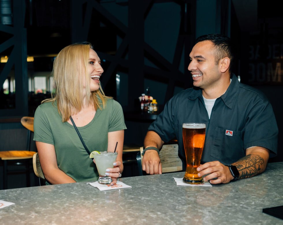 Two people having drinks at Bullwinkle's