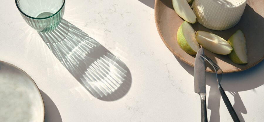 palm shade countertop ith glass and plate of fruit