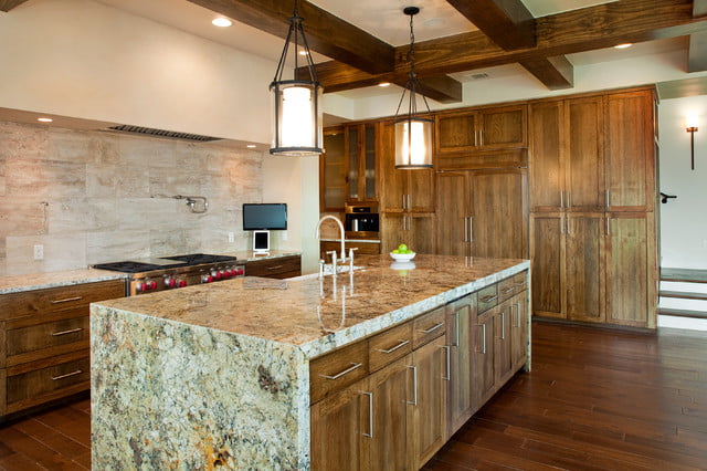 rustic kitchen with waterfall edge on the island 