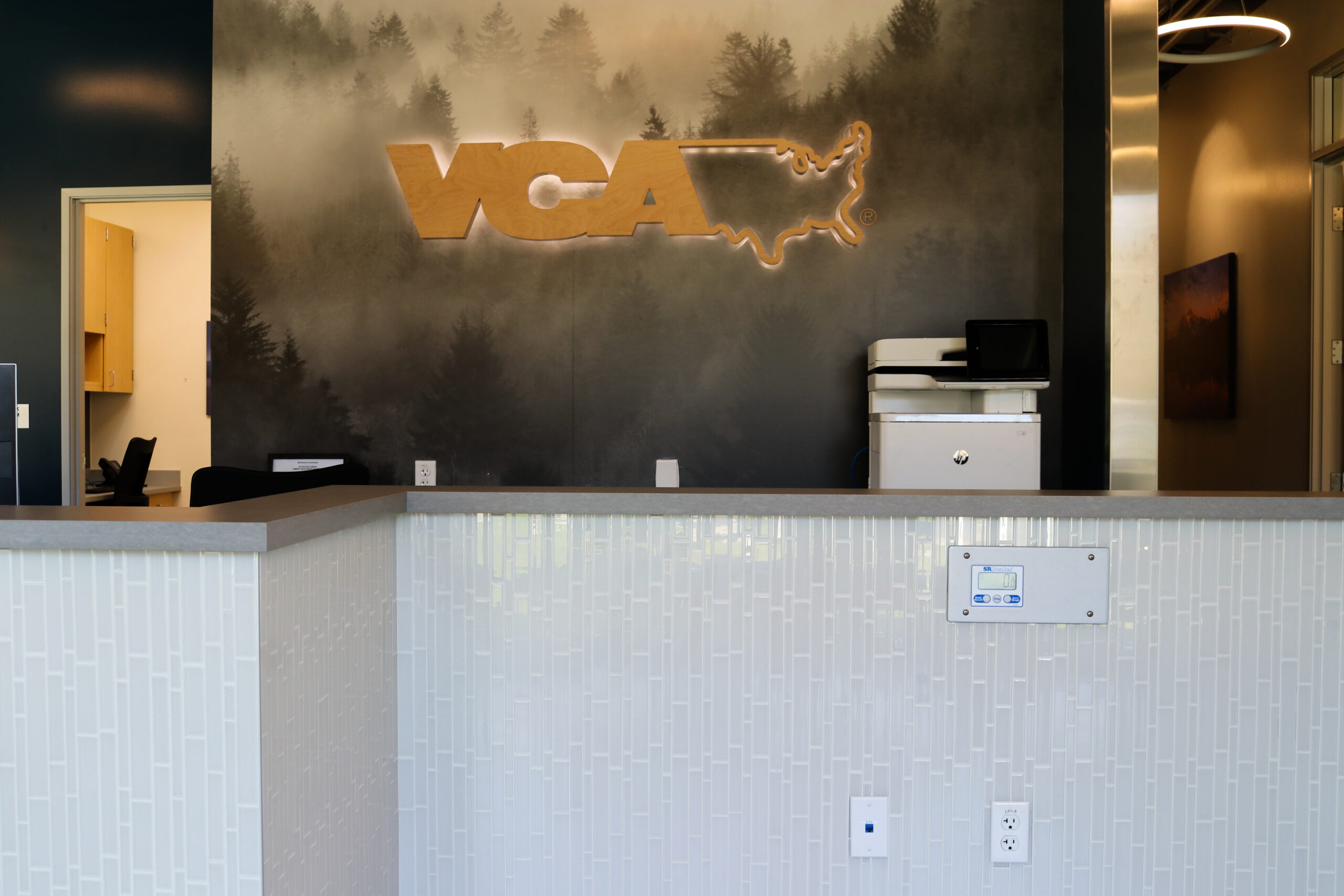 front desk wall signage of VCA animal hospital