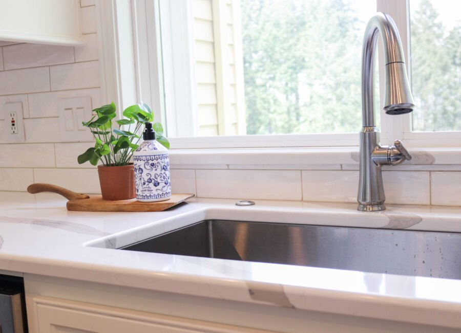 undermount sink with faucet and potted plant
