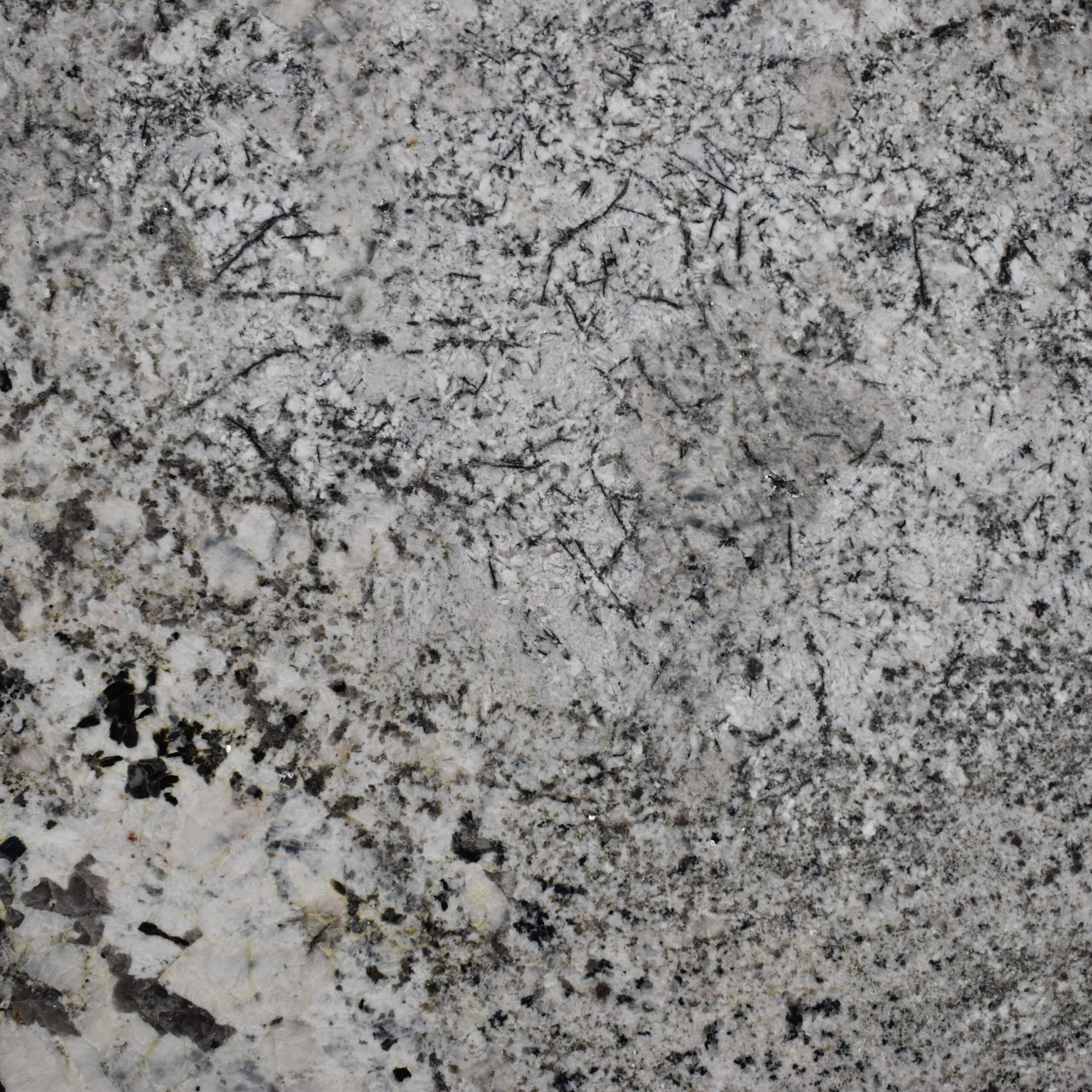 Stonemark Saddle White granite swatch