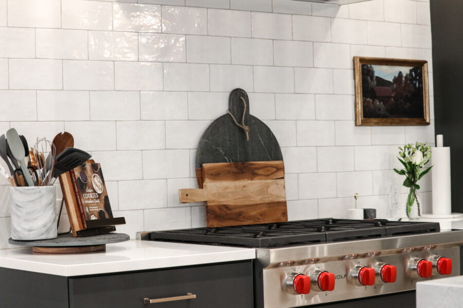 Complimentary grout color with white subway tile backsplash
