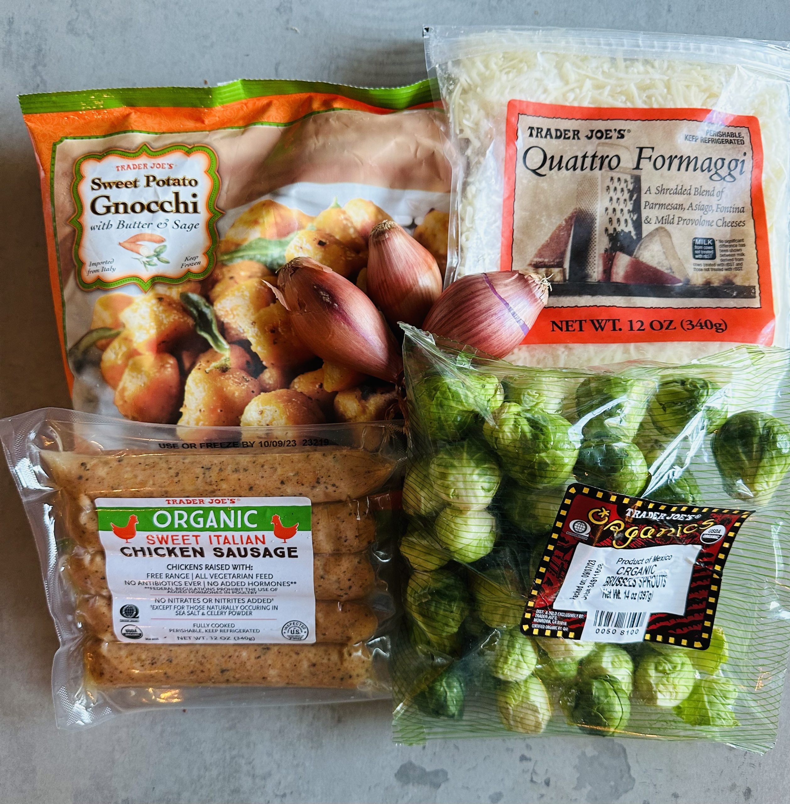 packaged sweet potato gnocchi, quattro formaggi shredded cheese, sweet italian chicken sausage, and brussels sprouts